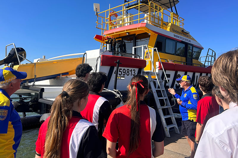 MRQ Gladstone volunteer show the vessel
