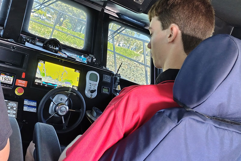 Student at the helm