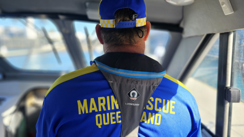 MRQ volunteer driving a vessel